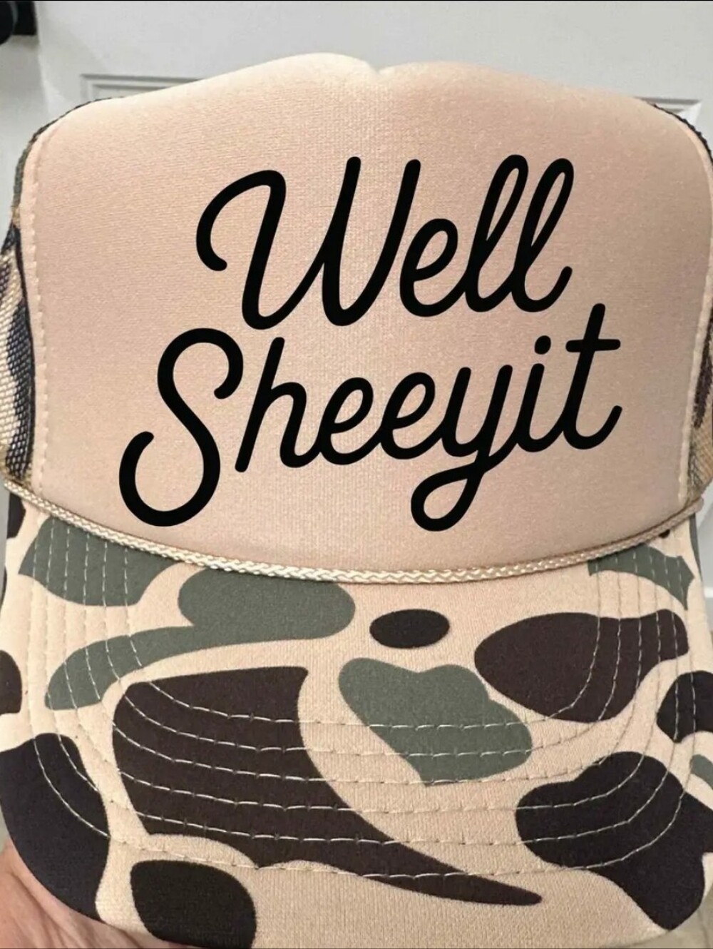 Beige "Well Sheeyit" Trucker Hat with Camo Brim